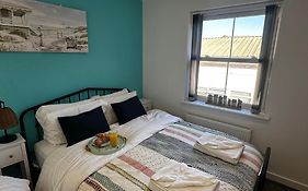 Sunny 2-Bedroom Coastal Stay With Free Parking